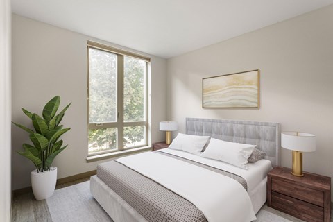 A bedroom with a large bed, a potted plant, and a painting on the wall.