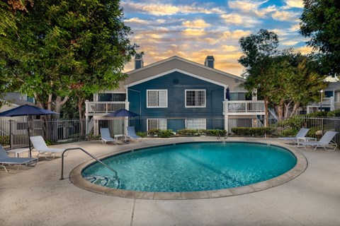 A house with a pool in the backyard.
