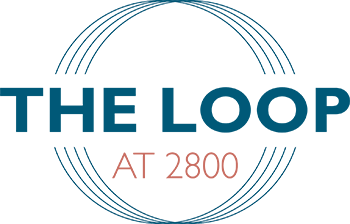 A logo with the text "THE LOOP AT 2800" in blue and red.