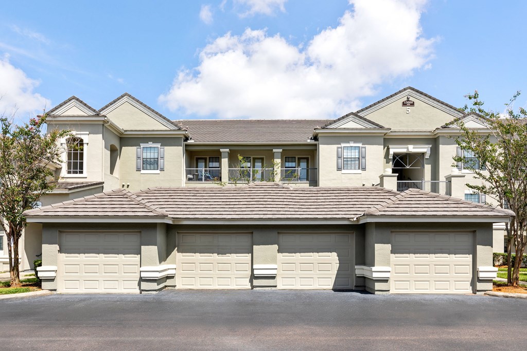 A large, two-story house with a garage.