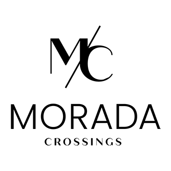 A logo with the letters MC and the words Morada Crossings.
