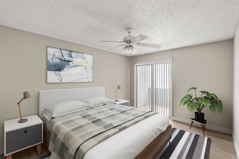 A bedroom with a bed, a ceiling fan, and a painting on the wall.