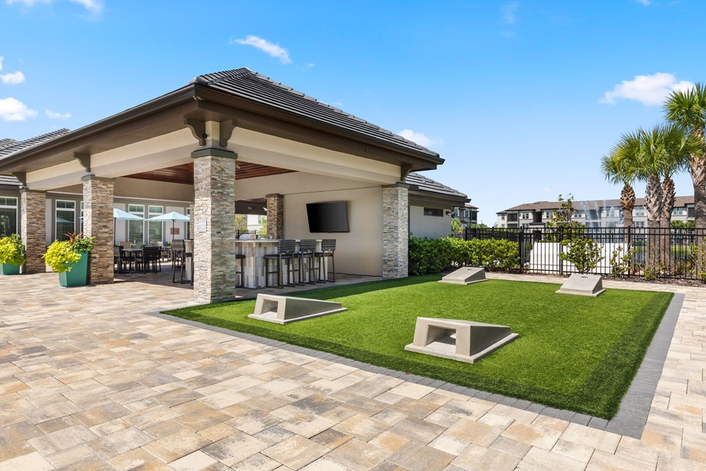 A house with a patio and a fence.