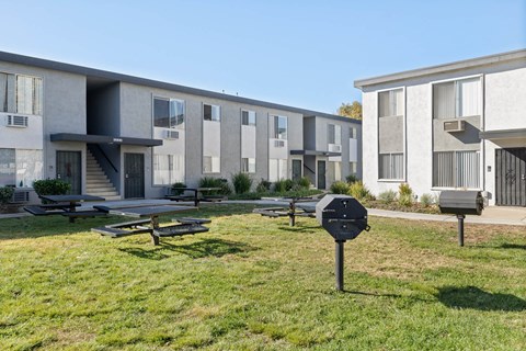 Apartment complex with a mailbox in front.