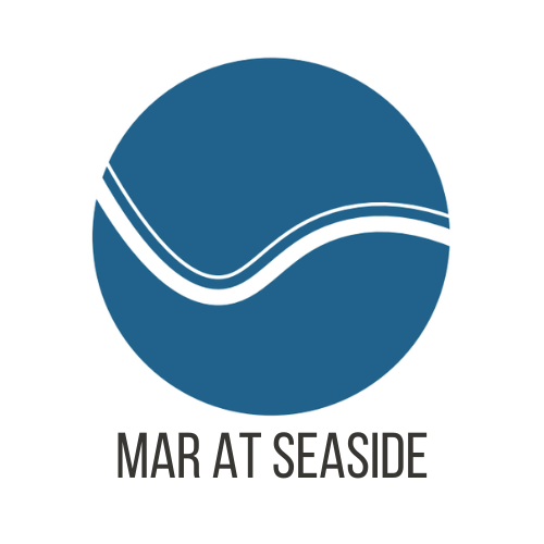 A logo with a blue circle and a white line design with the words "Mar At Seaside" below it.