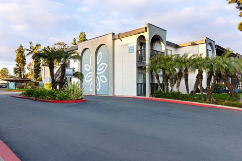 A building with a blue and white sign on the front.
