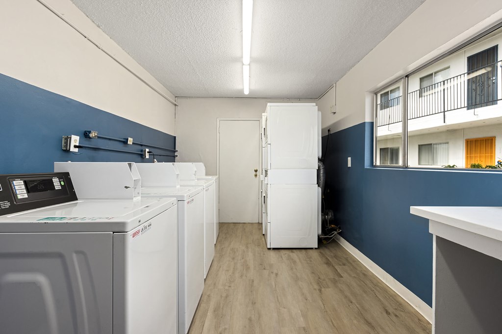 A laundry room with a washer and dryer.