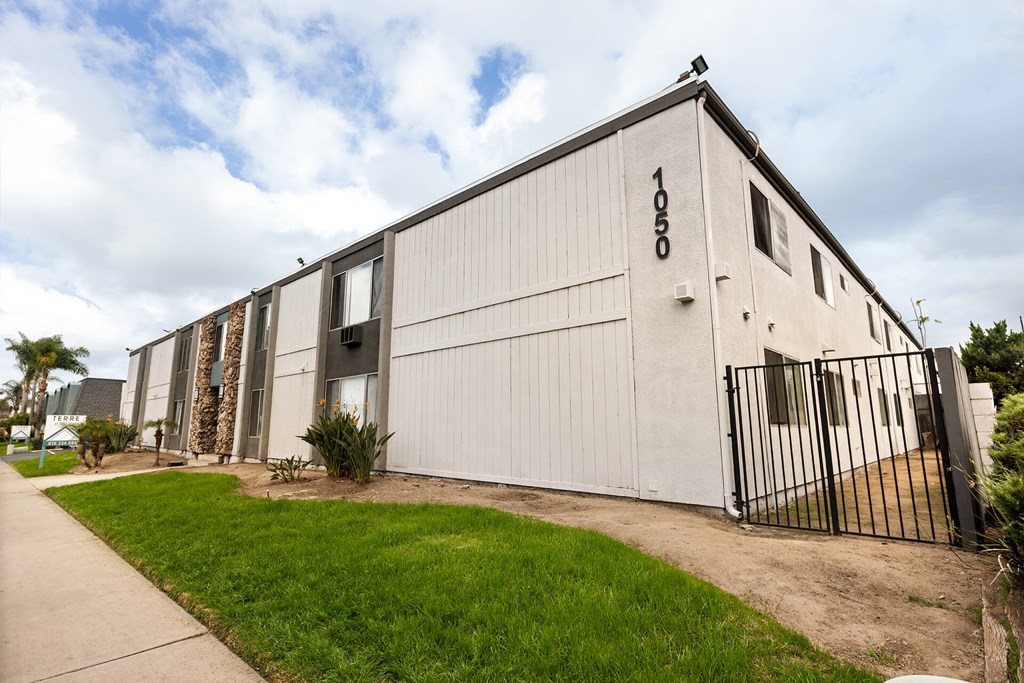 A large white building with the number 1020 on it.