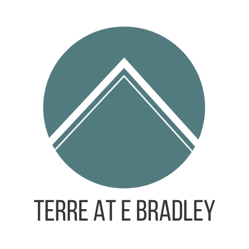 A logo with a circle and a triangle in the middle and the words "TERRE AT E BRADLEY" below it.