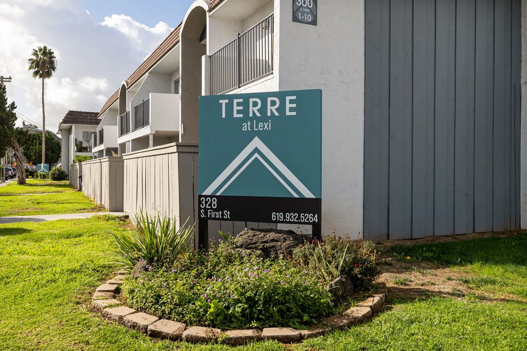 A sign for Terre at Lexi with a phone number on it.