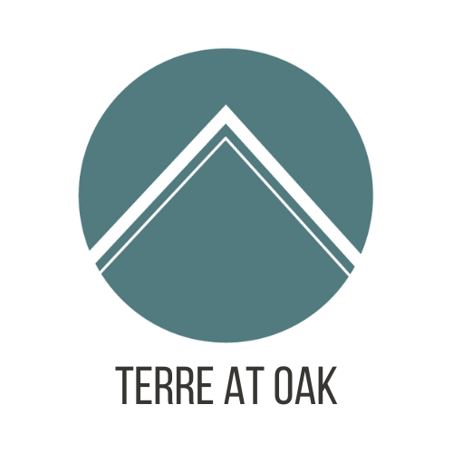 A logo with the text "TERRE AT OAK" below it.