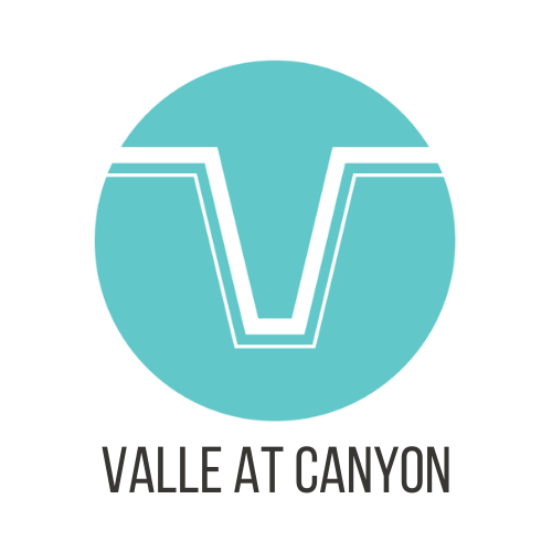 A logo with the text "Valle at Canyon" below it.