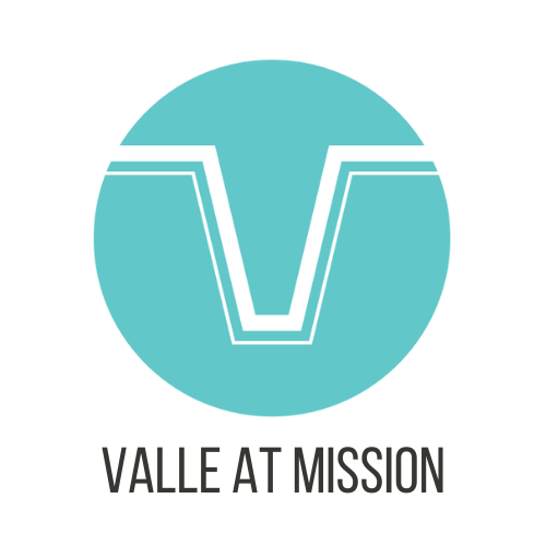 A logo with the text "Vallé at Mission" below it.