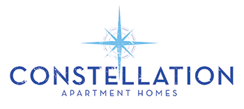 A logo for Constellation Apartment Homes featuring a compass-like symbol.