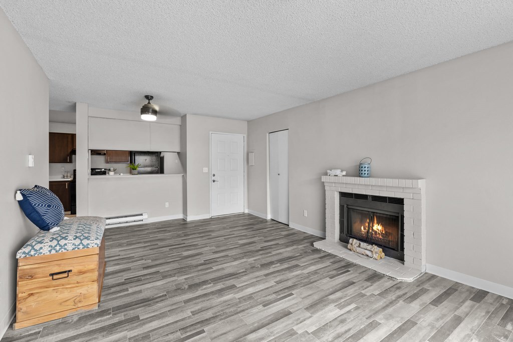 A room with a fireplace and a bed.