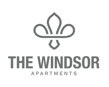 The logo for The Windsor Apartments features a stylized flower.