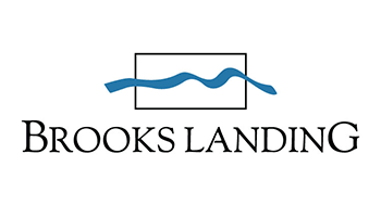 A logo with the words "Brooks Landing" and a graphic of a wave.