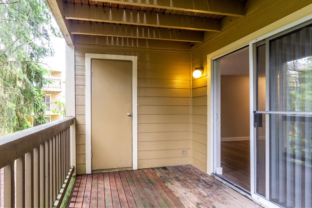 A small room with a door and a window.