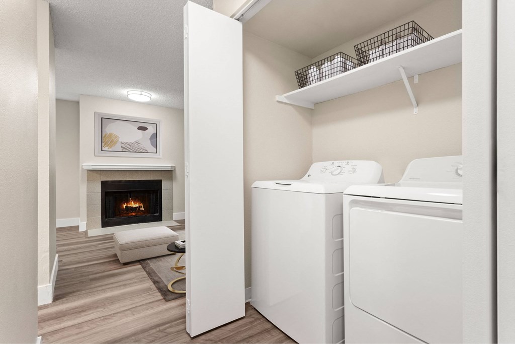 A laundry room with a washer and dryer.