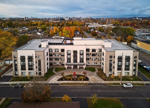 A large building with a courtyard in the middle of it.