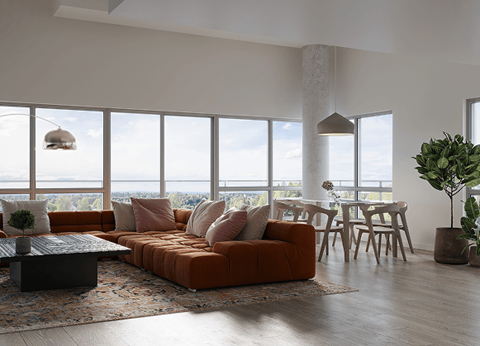 A modern living room with a large window overlooking the city at Petries Landing I Apartments , Ottawa