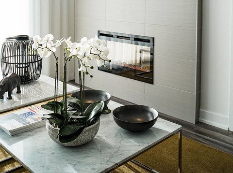 Modern living room with marble coffee table at Horizon Apartments, Gatineau