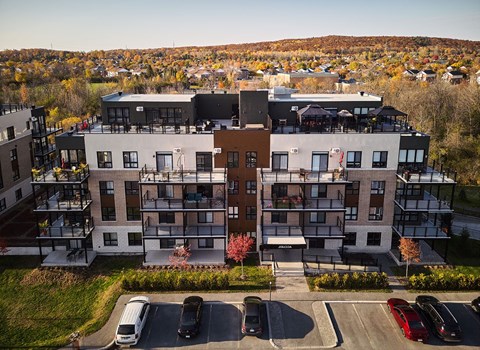 Modern apartment building with rooftop terrace at Horizon Apartments, Gatineau, QC