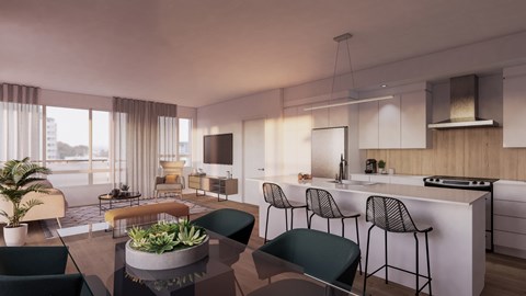 A modern kitchen with a dining table and chairs.