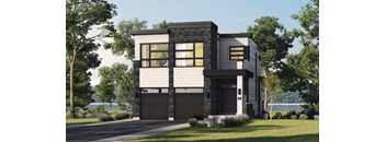 A modern house with a black and white exterior and a large front yard.