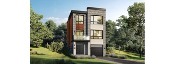 A modern two-story house with a garage is surrounded by greenery.