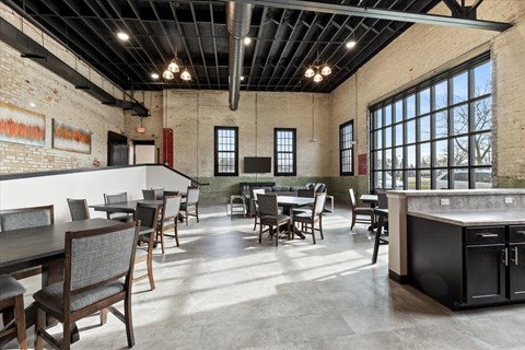 A large open space with tables and chairs.