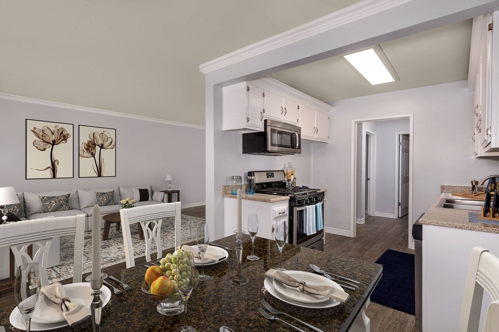 A modern kitchen with a breakfast table set.