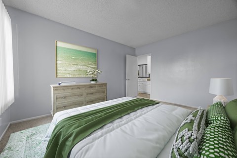 A bedroom with a bed, dresser, and a painting on the wall.