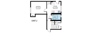 A floor plan of a unit with a bedroom, kitchen, and bathroom.