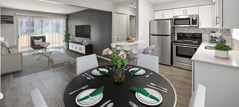 A modern kitchen with a dining table set for four.
