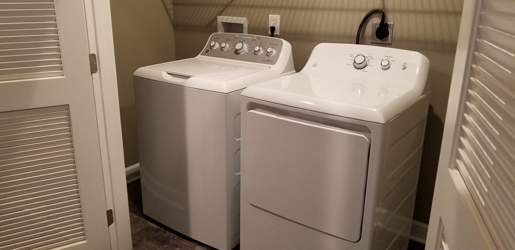 the washer and dryer in the laundry room