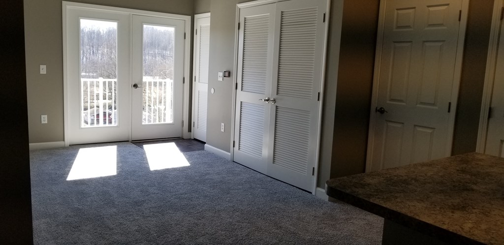 the living room doors and a balcony