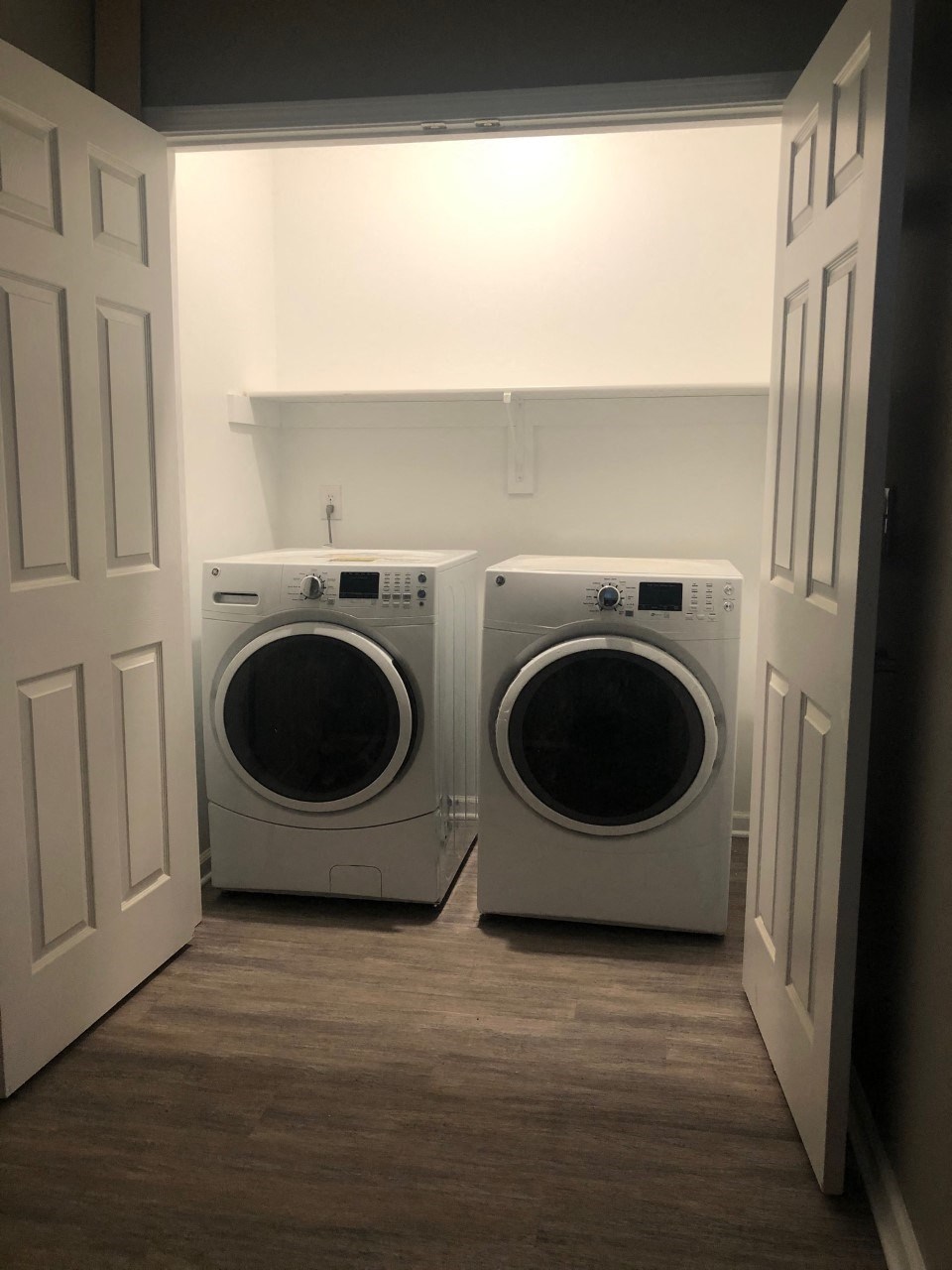 a laundry room with two washing machines in it