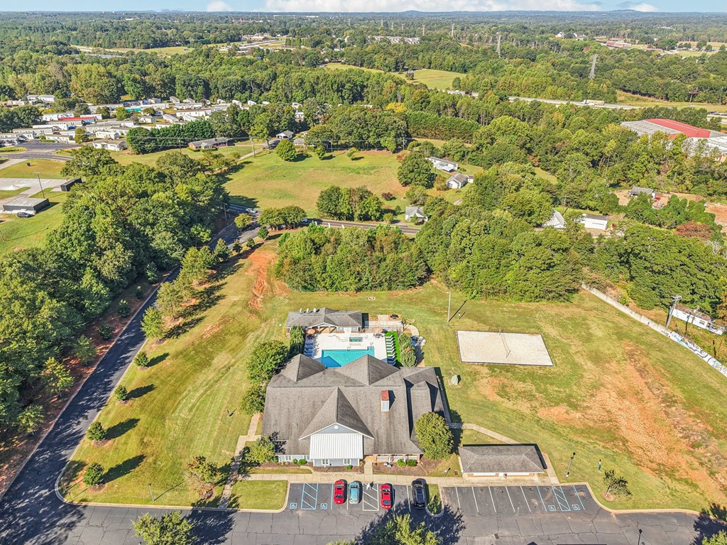 A large house with a pool in the backyard.