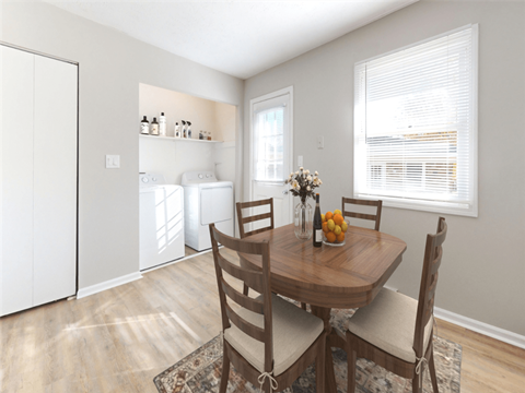 A dining room with a table set for two at Stonebrook of Franklin Apartments, Indiana, 46131