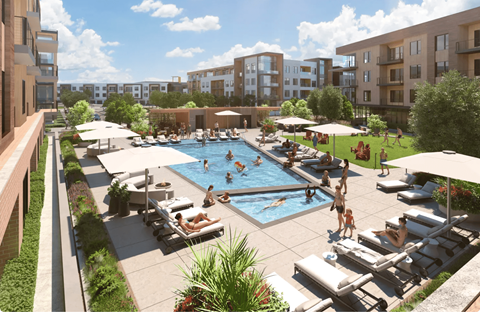 A large pool with people swimming and relaxing in the sun.