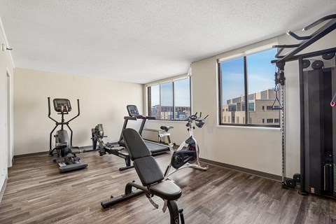 Fitness center with cardio and strength equipment at Irvine Park Towers