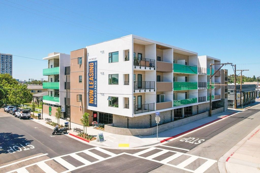 A multi-story building with the words