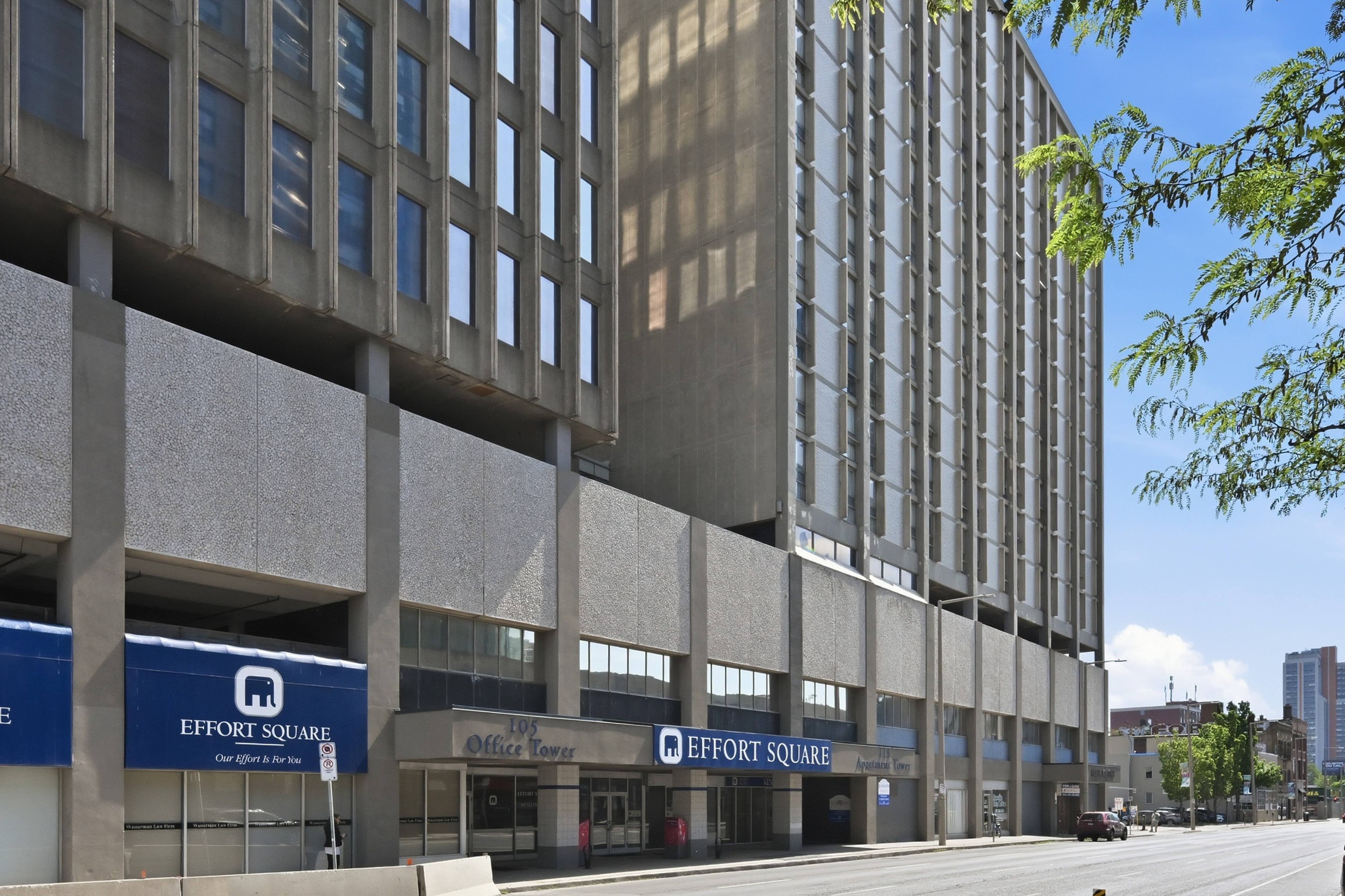 A large building with a sign that says Effort Square.