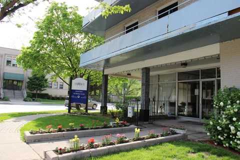 A building with a sign that says "Terrace" in front of it.