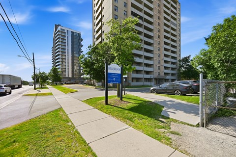 A street view with a sign that says "Bellmore".