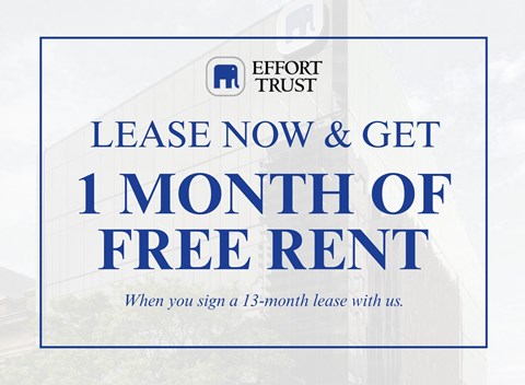 A sign advertising a free month of rent for signing a 13-month lease.