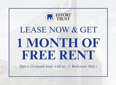 A sign advertising a free month of rent for signing a 13-month lease with Effort Trust.