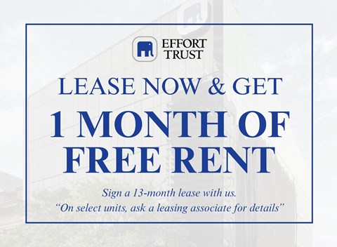 A sign advertising a free month of rent for signing a 13-month lease.