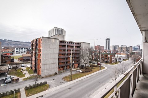 A view of a city from a balcony.